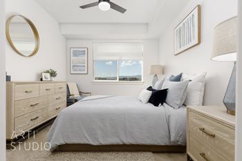 Bedroom with bed and dresser